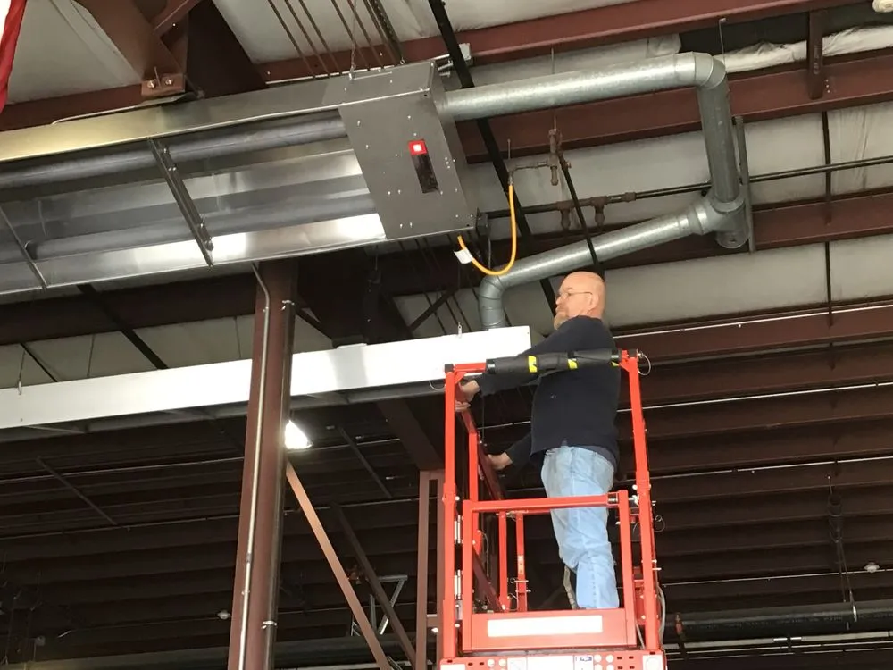 Slide of Kuhn Building services