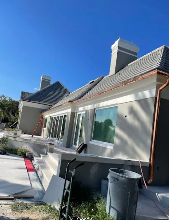 Slide of K&W Gutters and Aluminum