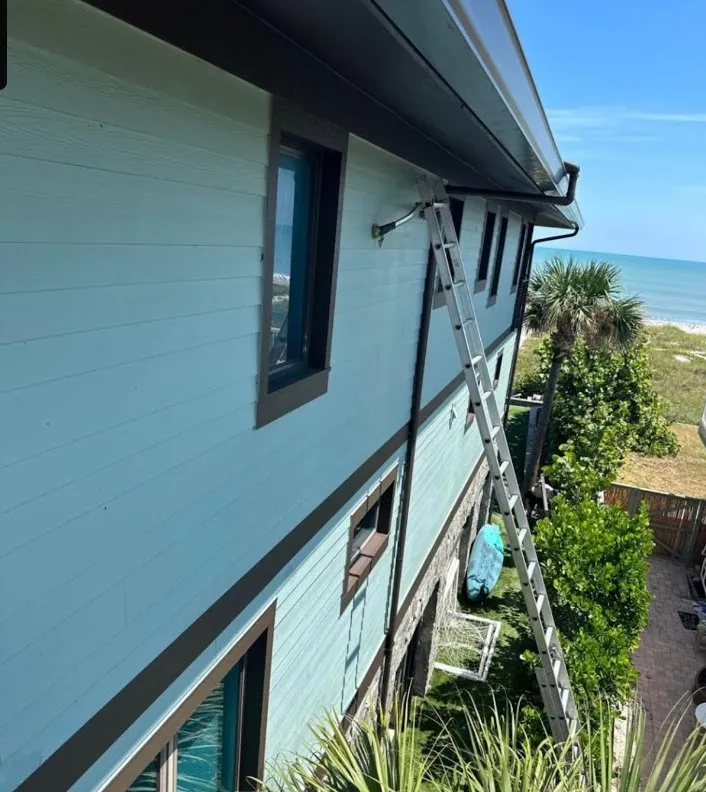 Slide of K&W Gutters and Aluminum