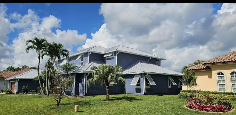 Slide of K&W Gutters and Aluminum