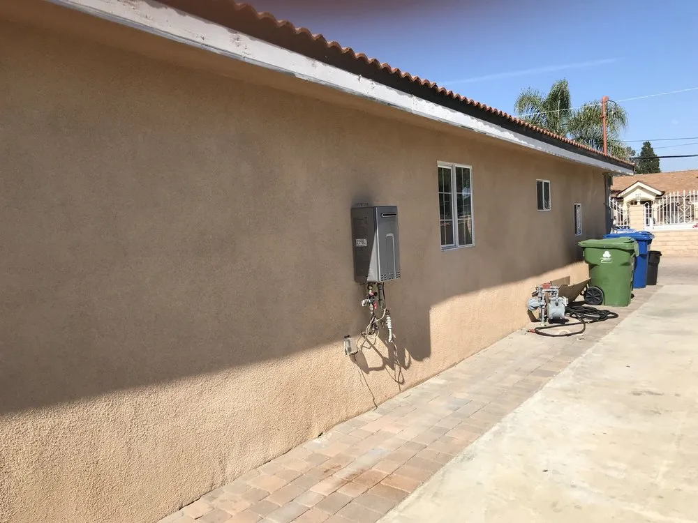 Slide of LA Plumbing and Builders