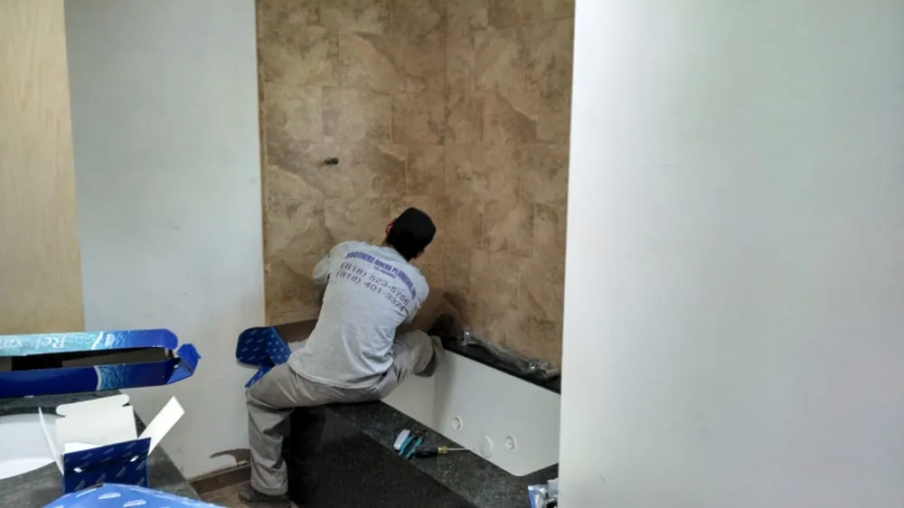 Slide of LA Plumbing and Builders