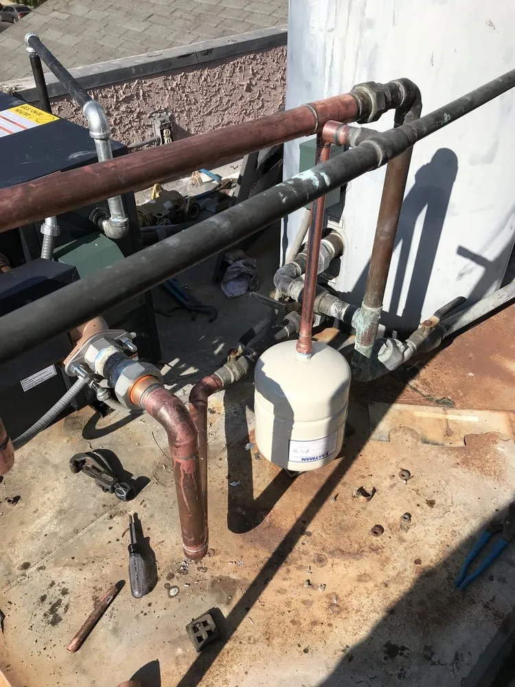 Slide of LA Plumbing and Builders