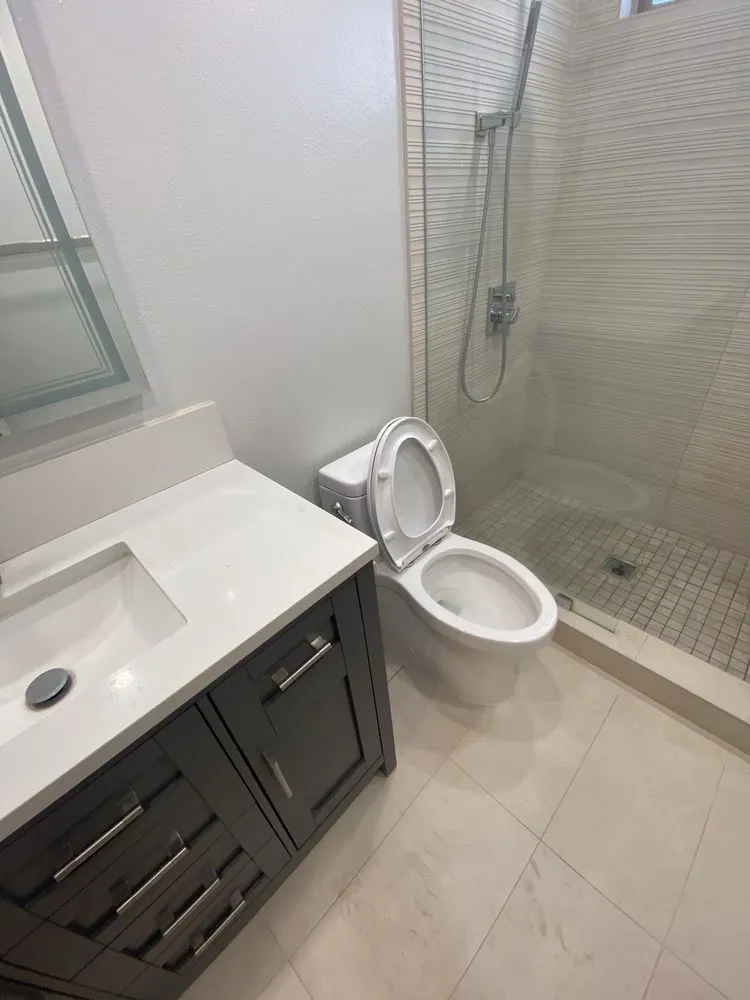 Slide of LA Plumbing and Builders