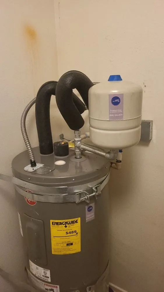 Slide of Lang's Plumbing & Rooter