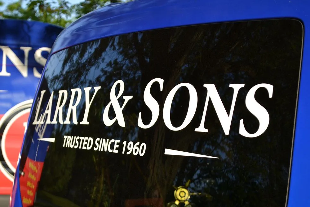 Slide of Larry & Sons
