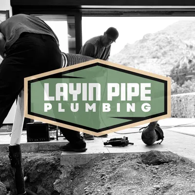 Layin Pipe Plumbing Logo
