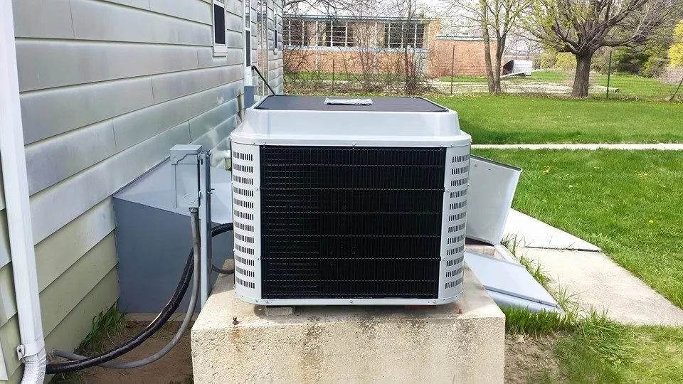 Professional water heater service for homes in Richmond, IL by Leader Mechanical Services