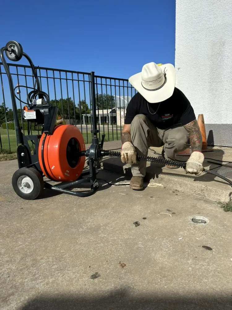 Slide of Leak Wranglers Plumbing