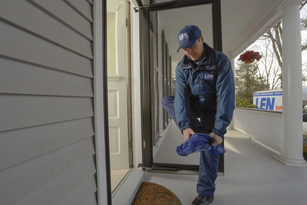 Slide of Len The Plumber