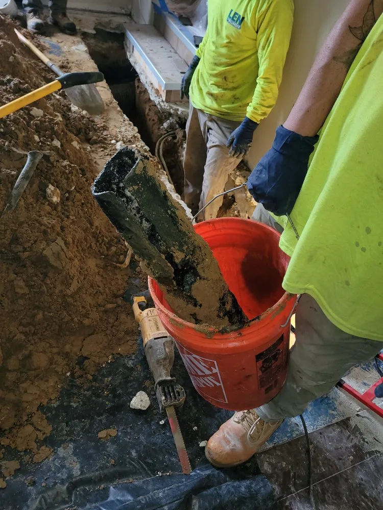 Slide of Len The Plumber