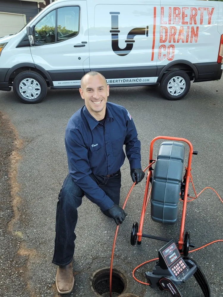 Slide of Liberty Drain Co