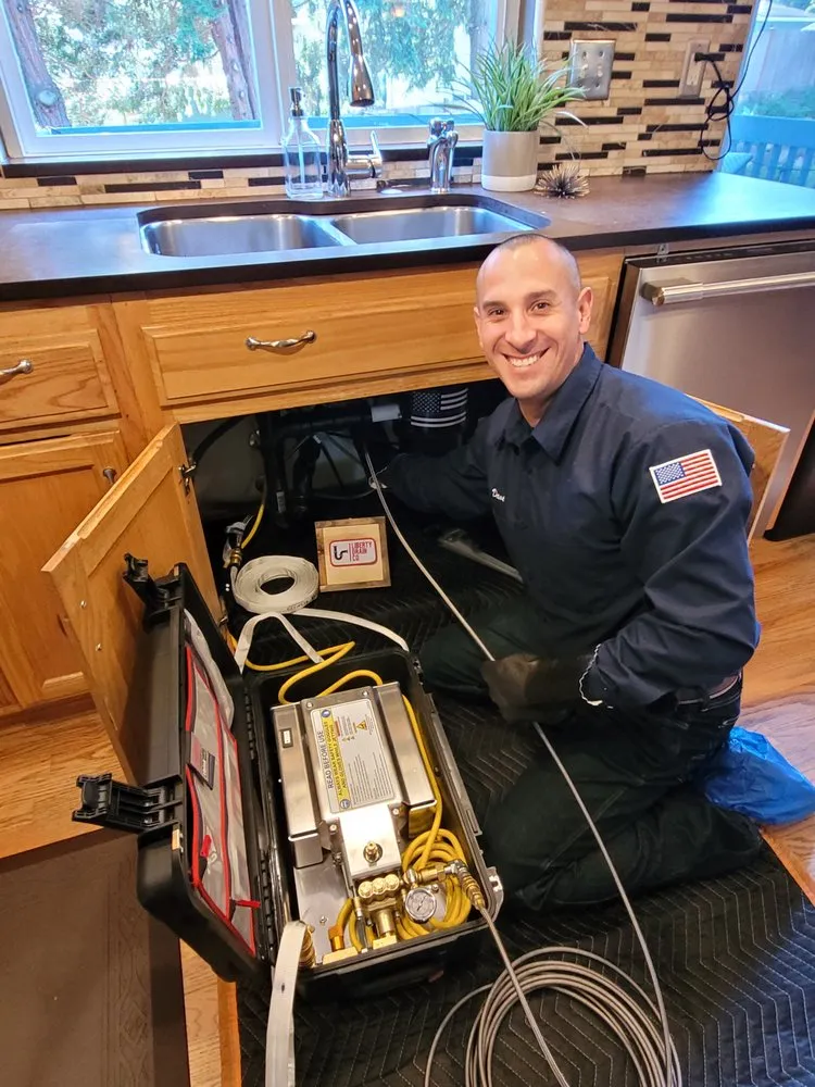 Slide of Liberty Drain Co