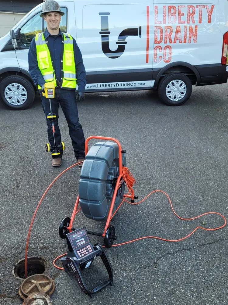 Slide of Liberty Drain Co