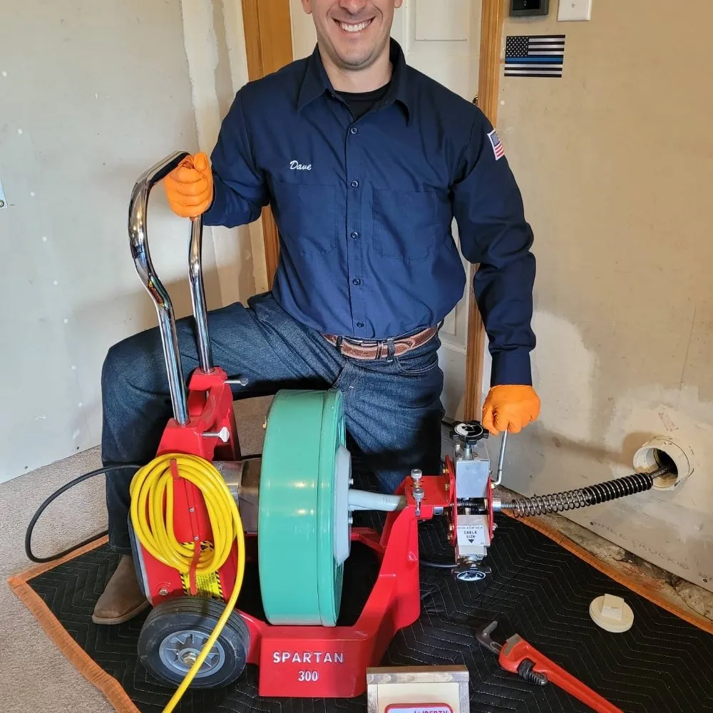 Slide of Liberty Drain Co