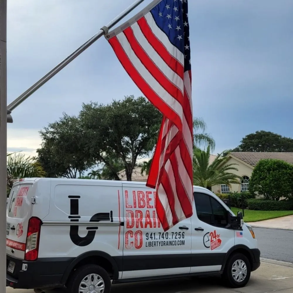 Slide of Liberty Drain Co