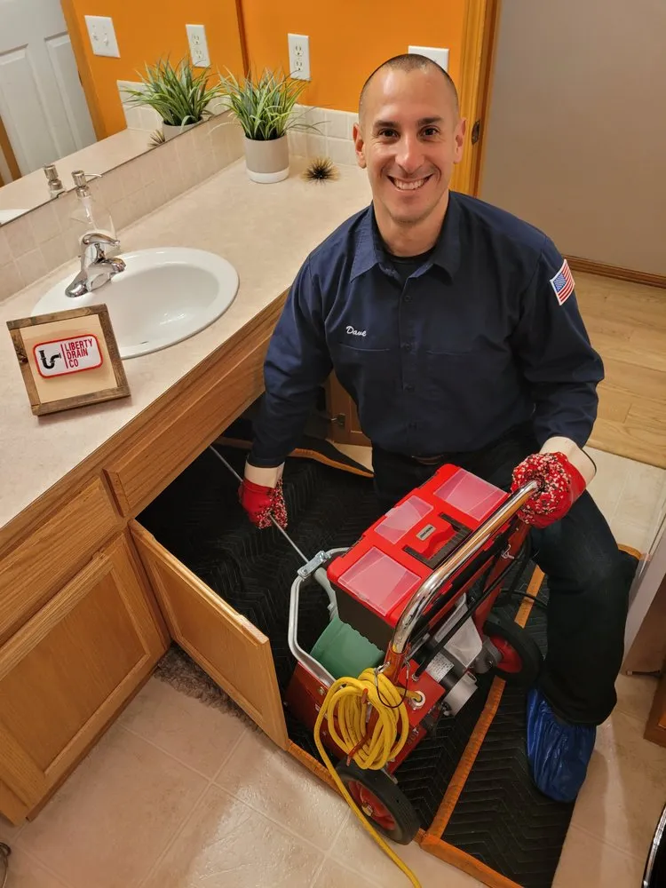 Slide of Liberty Drain Co