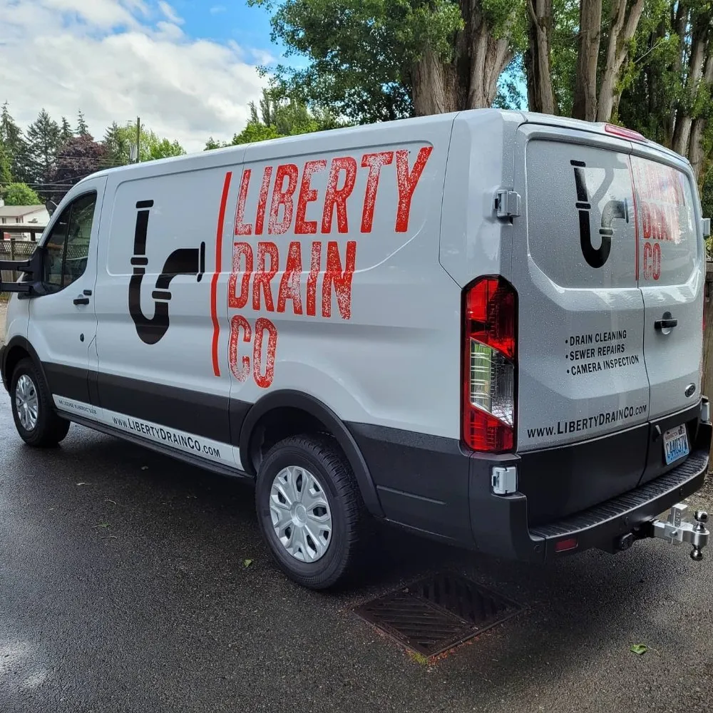 Slide of Liberty Drain Co