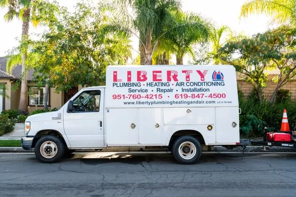 Liberty Plumbing, Heating & Air Conditioning Logo