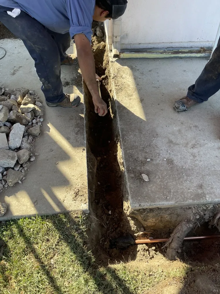 Slide of LIL Red's Plumbing Rooter