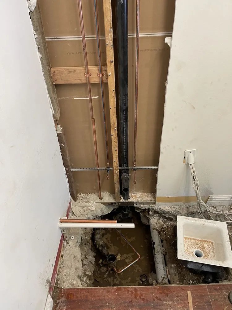 Slide of LIL Red's Plumbing Rooter