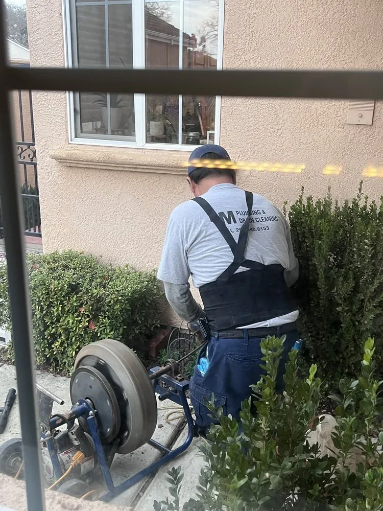 Slide of LM Plumbing And Drain Cleaning