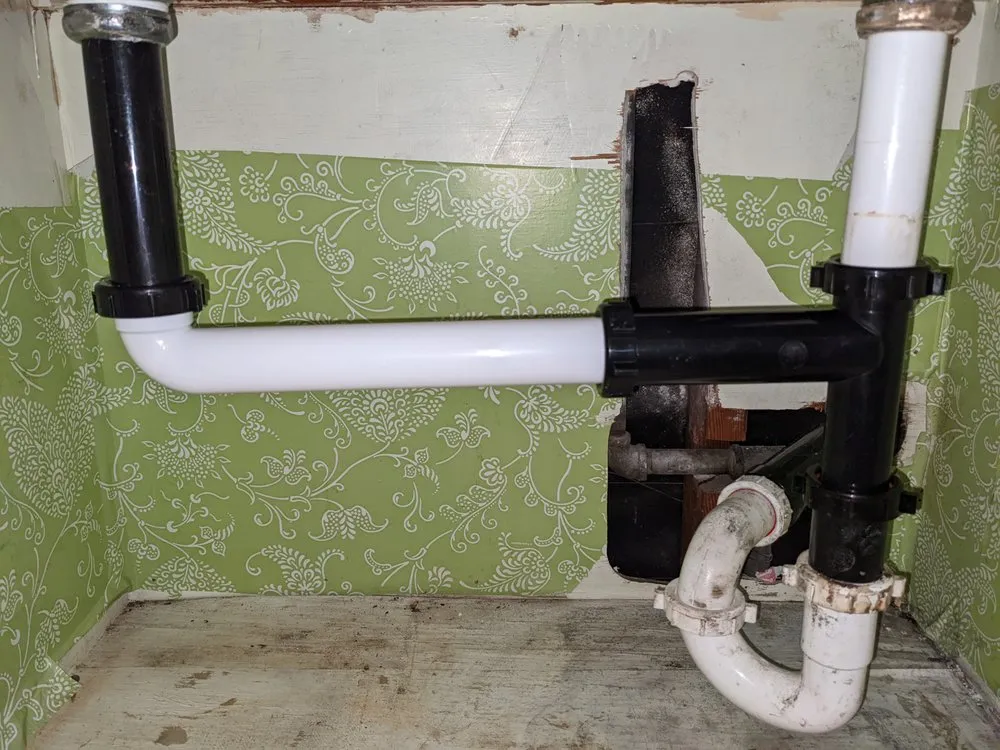 Slide of LM Plumbing And Drain Cleaning