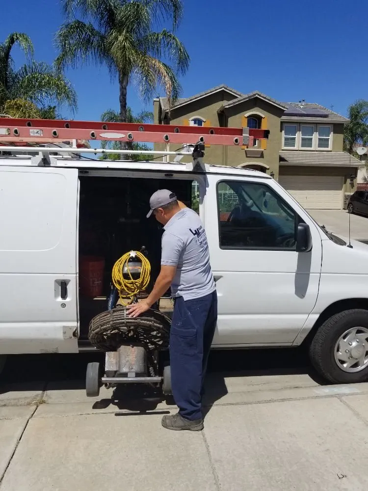 Slide of LM Plumbing And Drain Cleaning