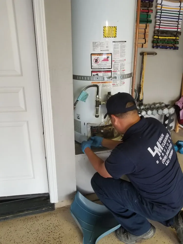 Slide of LM Plumbing And Drain Cleaning