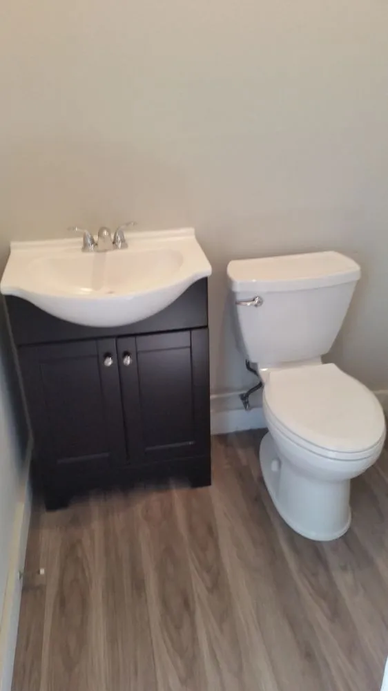 Slide of Lou's Plumbing Services