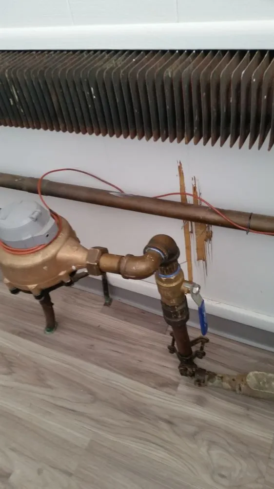 Slide of Lou's Plumbing Services