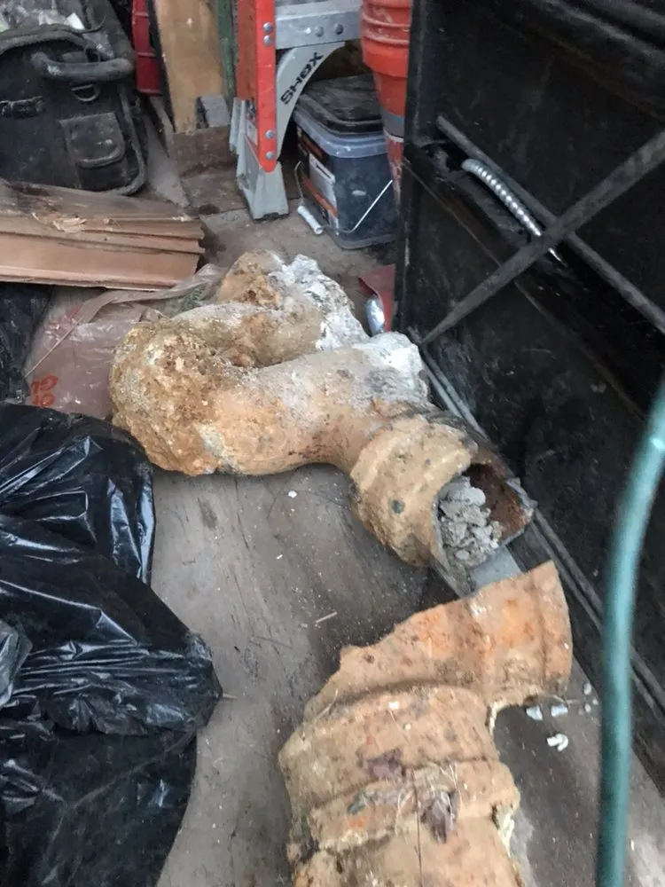 Slide of Lou's Plumbing