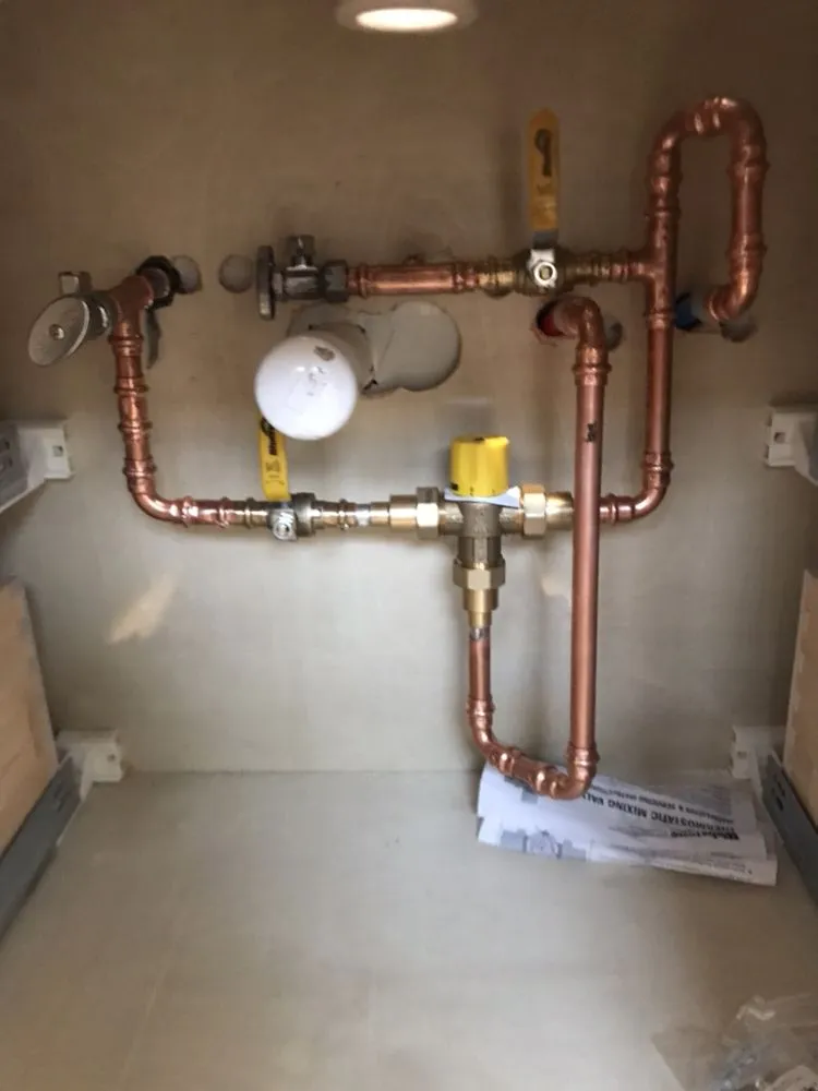 Slide of Lou's Plumbing