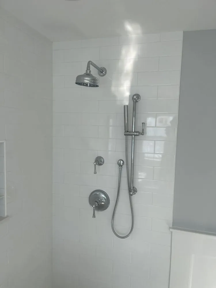 Slide of Lou's Plumbing