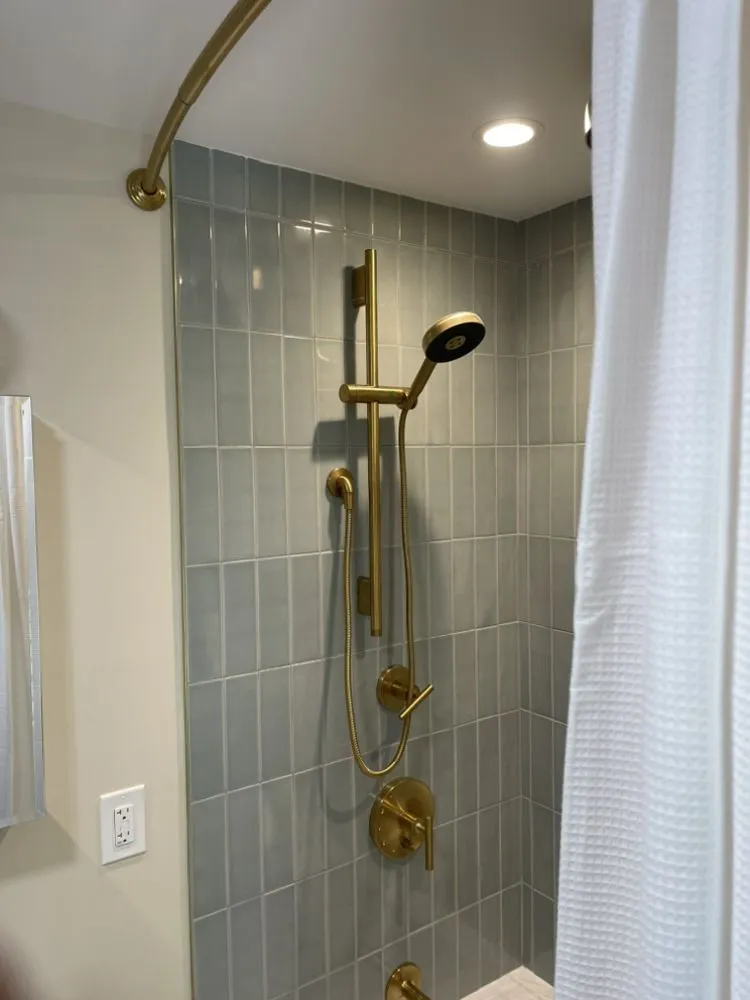 Slide of Lou's Plumbing