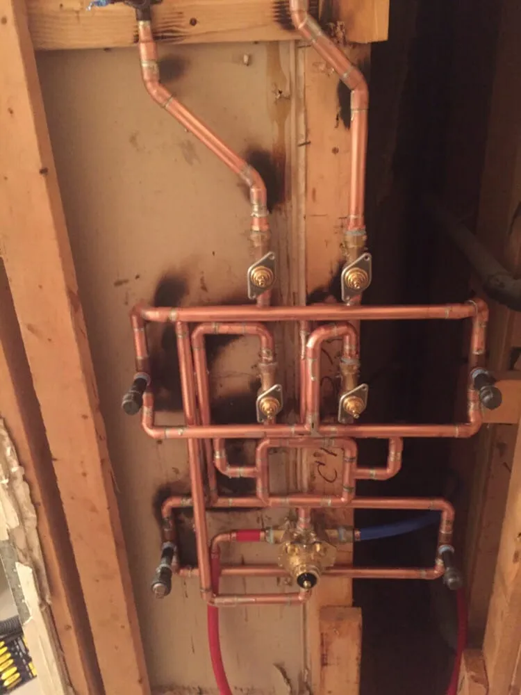 Slide of Lou's Plumbing