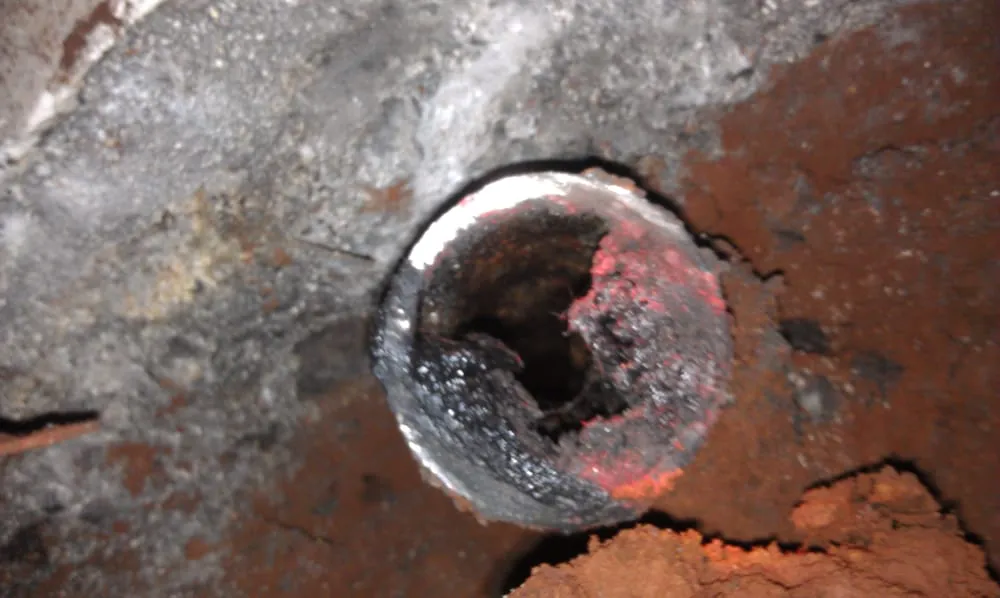 Slide of Low Cost Drain Plumbing