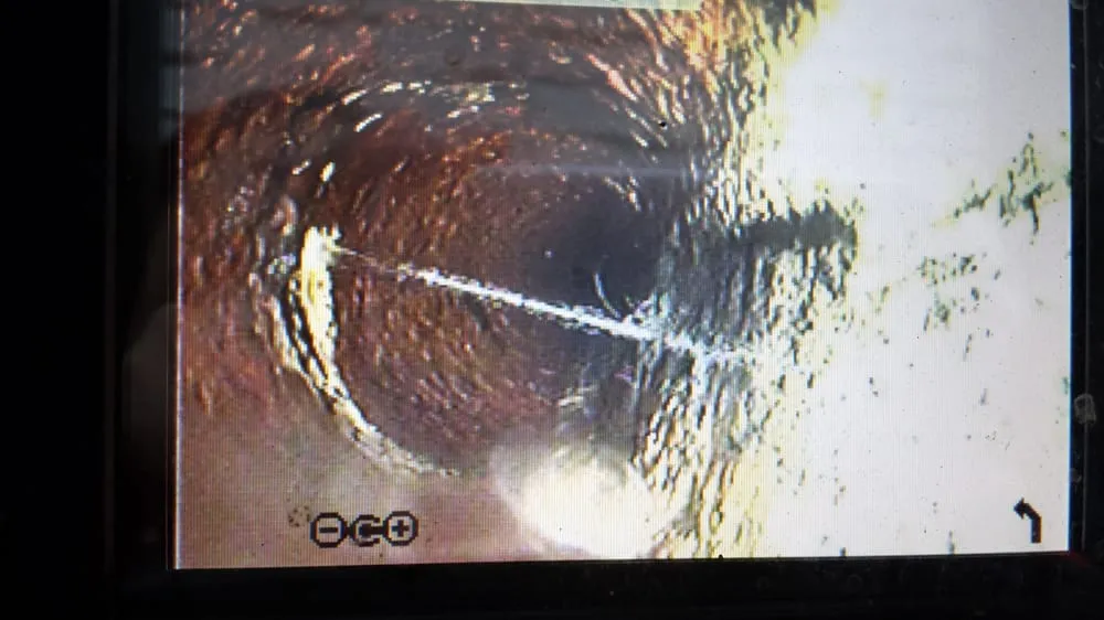 Slide of Low Cost Drain Plumbing