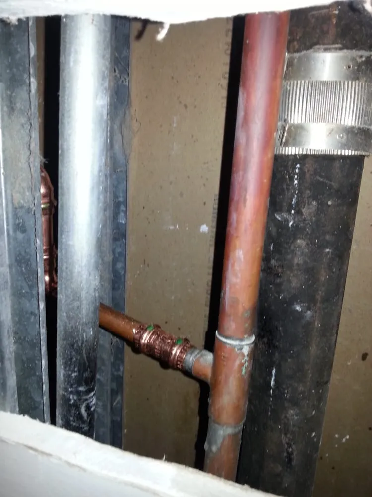 Slide of Low Cost Drain Plumbing