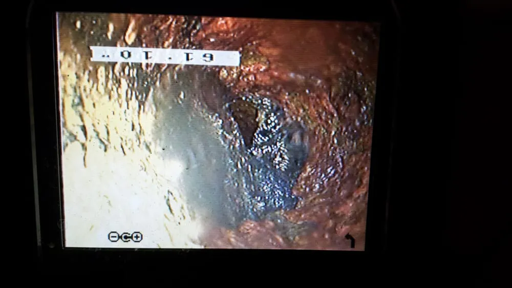 Slide of Low Cost Drain Plumbing