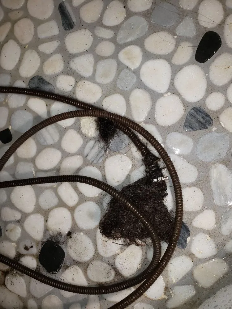 Slide of Low Cost Drain Plumbing