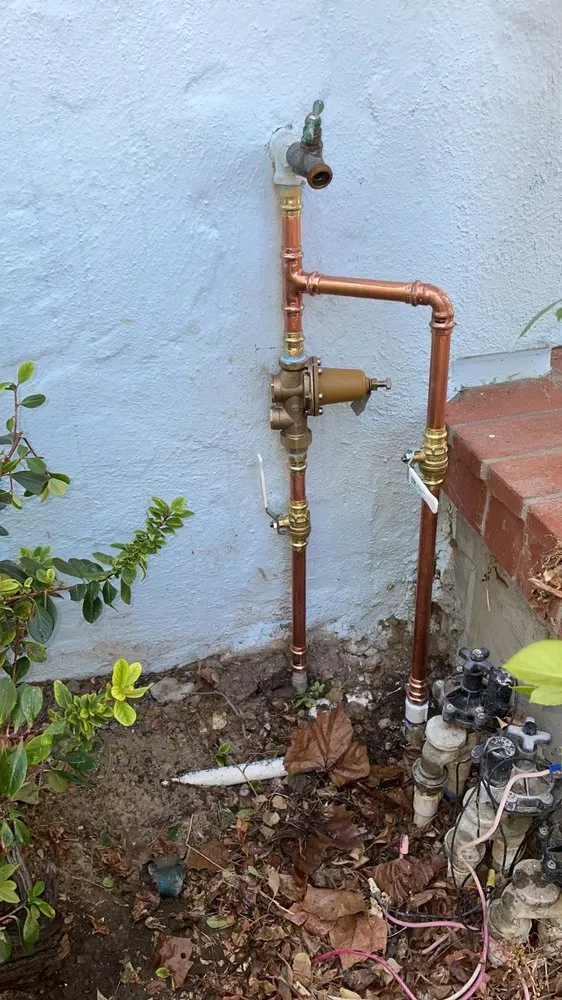 Slide of Lucky Guys Rooter Plumbing