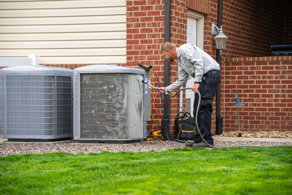 Reliable water heater service experts serving Longmont, CO - M and M Heating & Cooling, Plumbing & Electrical