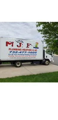 M J F Plumbing & Heating Logo