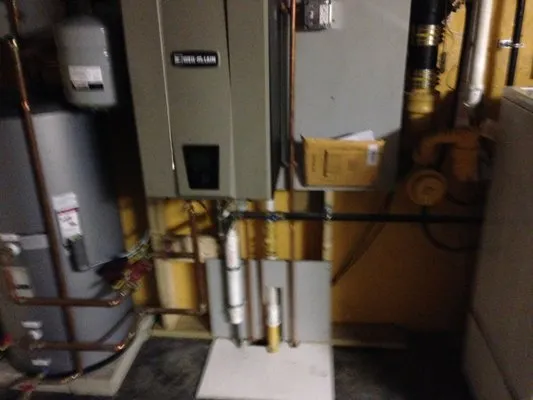 Mackenzie Plumbing Logo