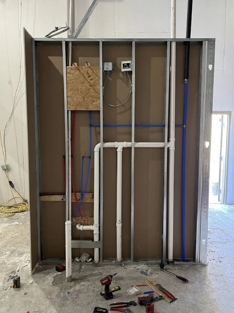 Slide of Mack's Plumbing, TX