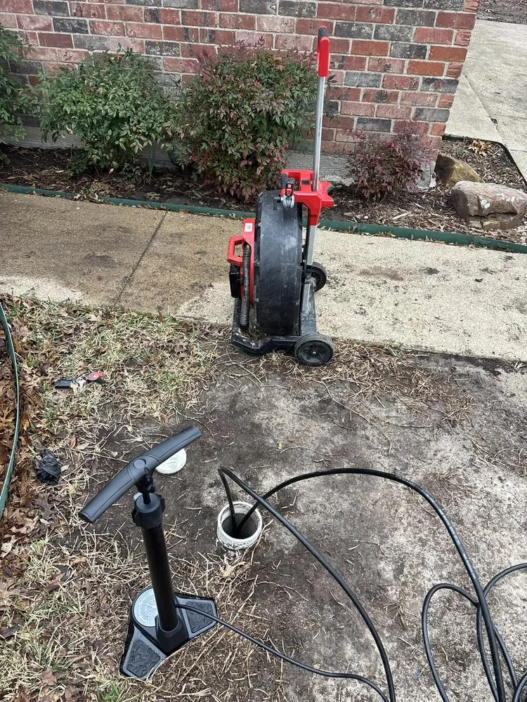 Slide of Mack's Plumbing, TX
