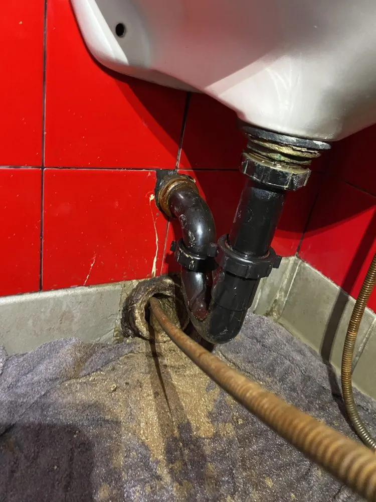 Slide of Mac’s Plumbing