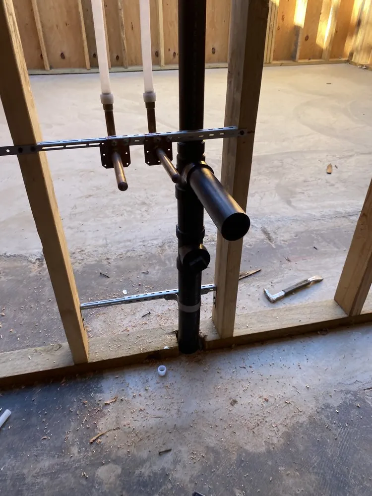 Slide of Mac’s Plumbing