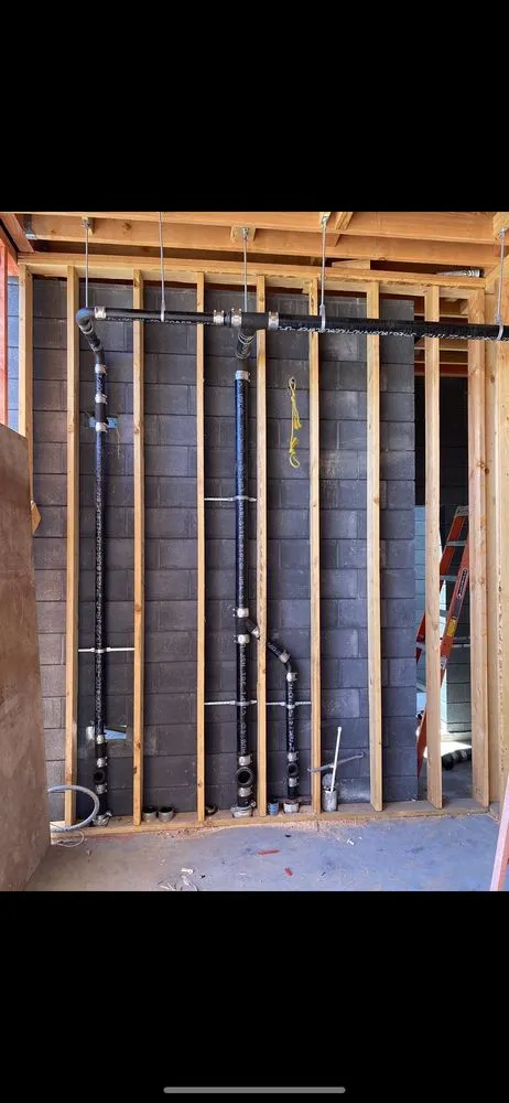 Slide of Mac’s Plumbing